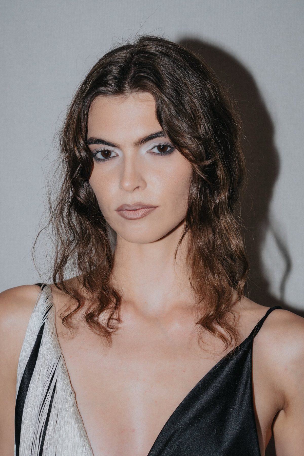 Close-up of tousled wavy texture, Christian Cowan Spring 2027 backstage