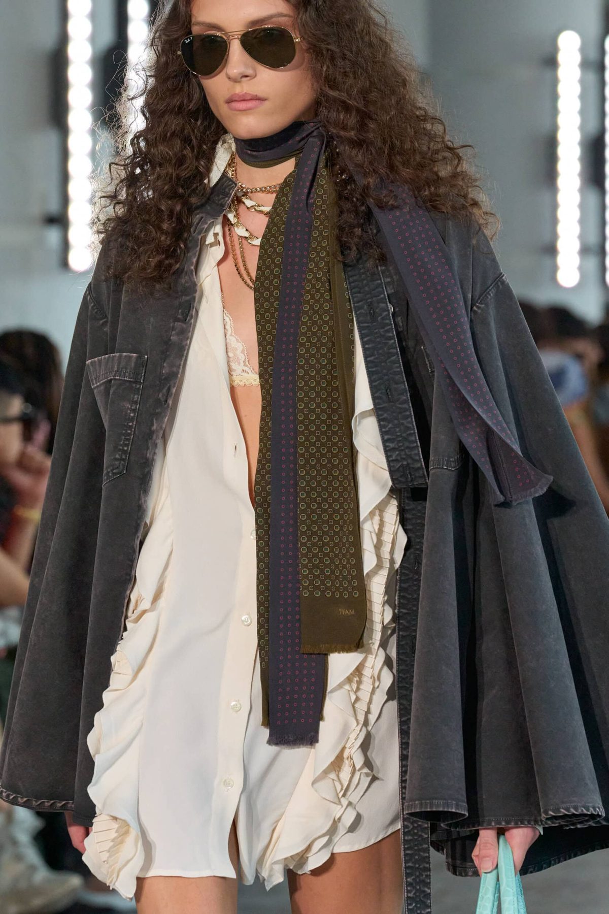Close-up beauty detail of voluminous curls, 7 For All Mankind Spring 2027 show